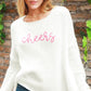 'CHEERS' CREWNECK SWEATER