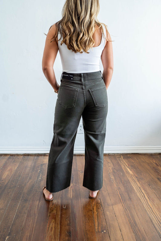 women's green raw edge denim